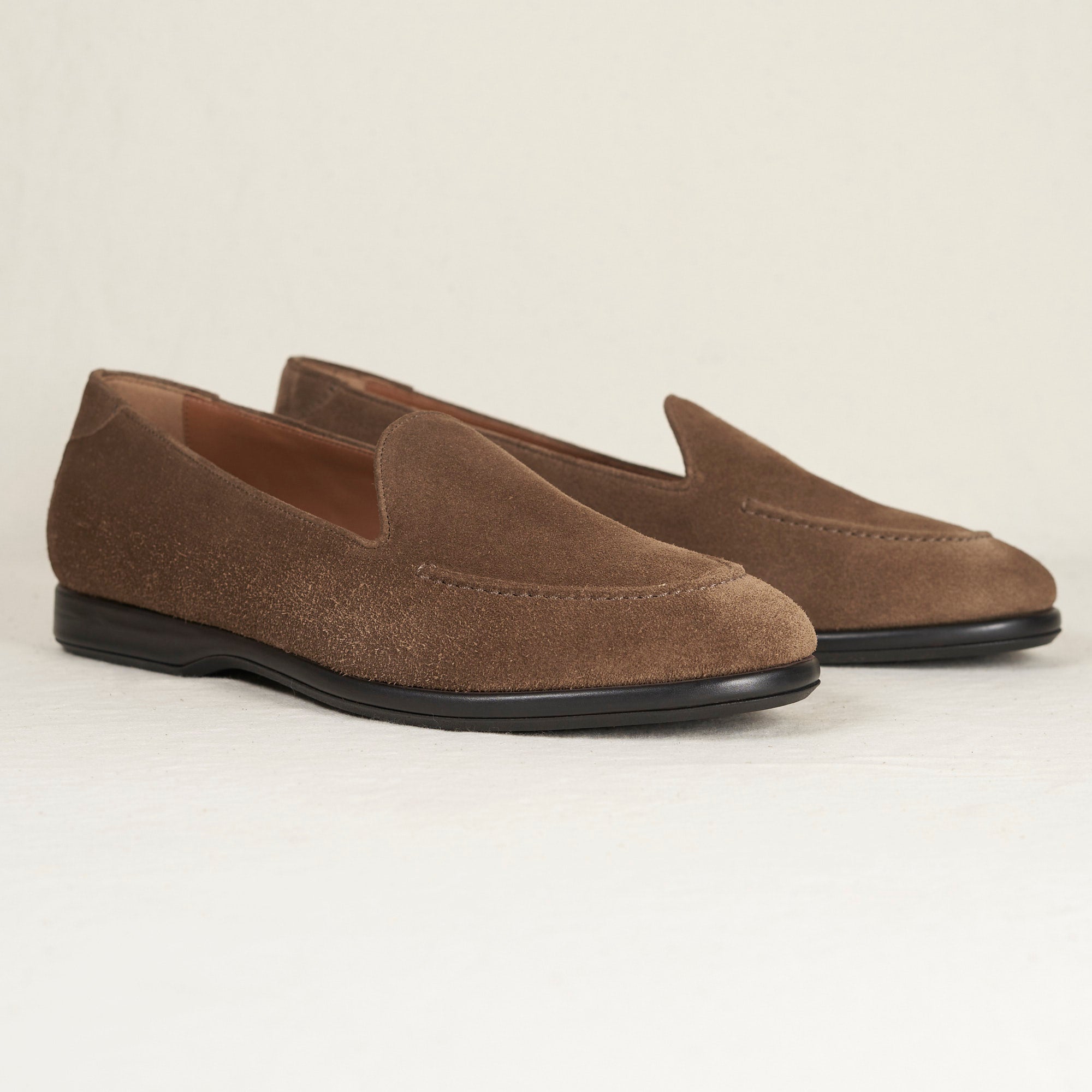 Angled view of August Special Augie Type-S Tobacco suede loafer — hand-sewn vamp stitch, Harry Last fit.