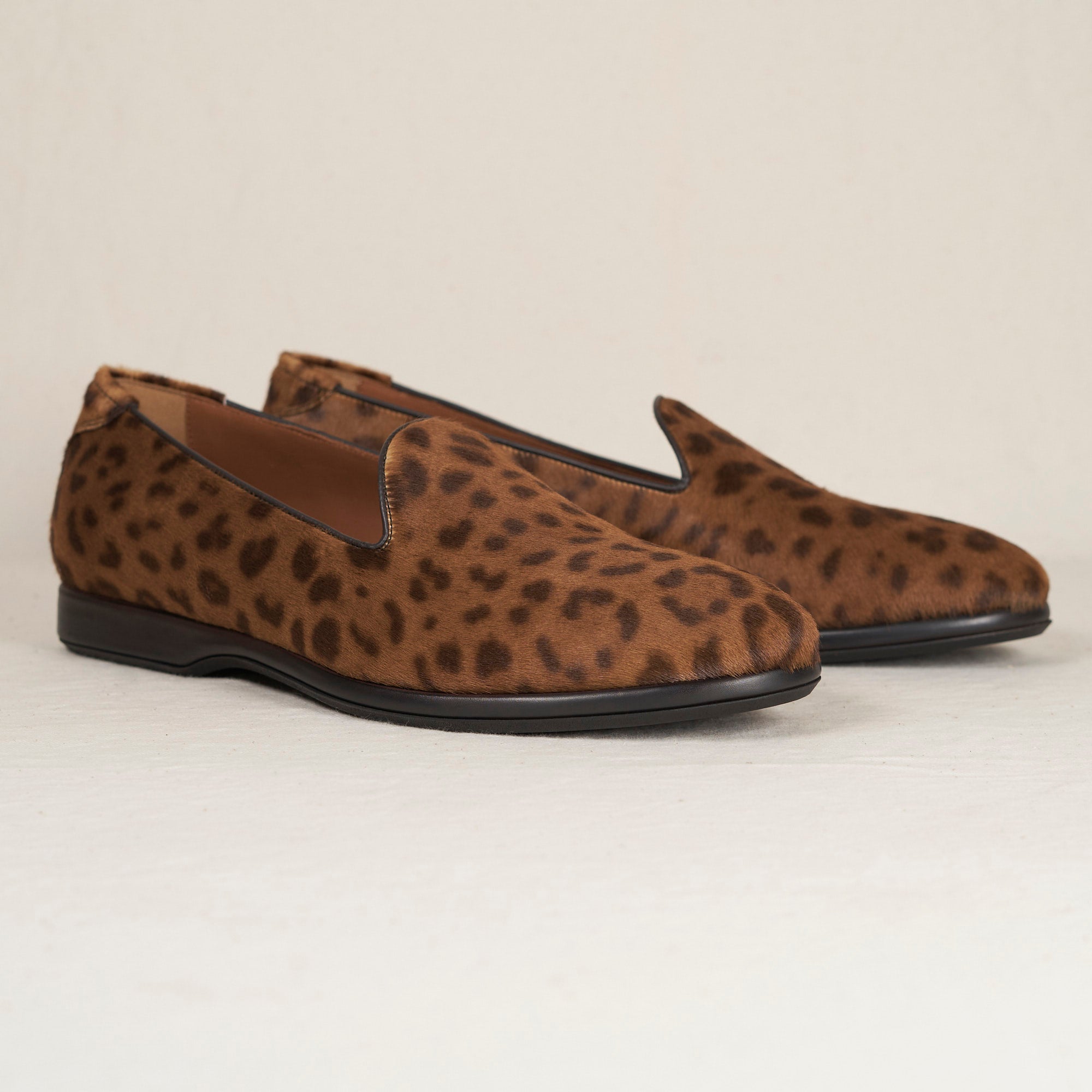 Augie Type-P Leopard Haircalf loafers – pair, three-quarter front view, brown haircalf with dark leopard print.