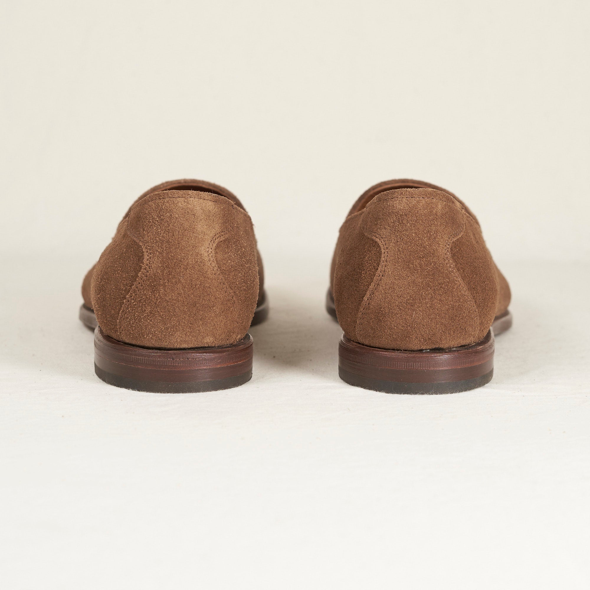 Back heel view of August Special Augie Type-GS men's cubano suede Goodyear slip-on — padded insole, Harry Last fit.