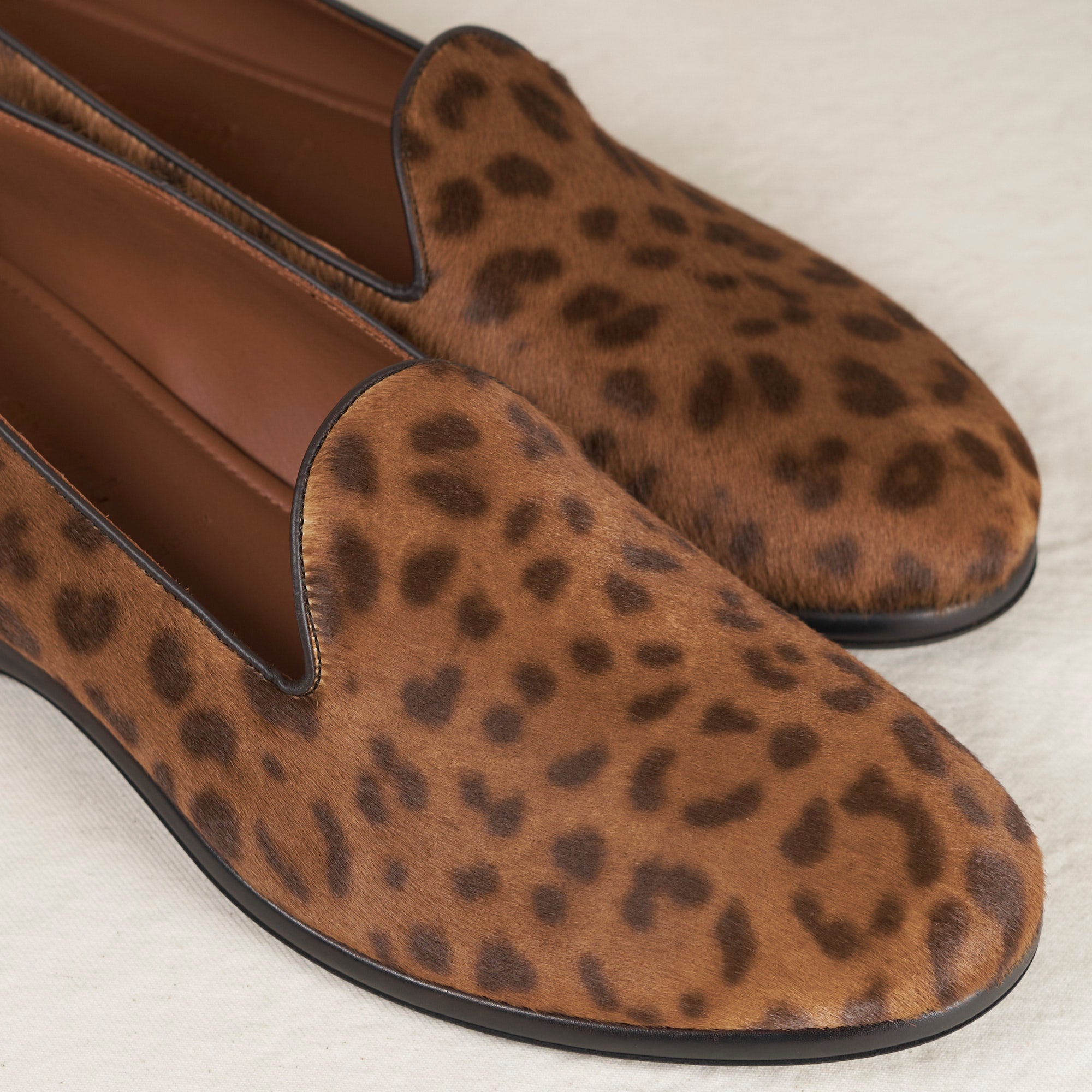 Augie Type-P Leopard Haircalf loafers – pair, three-quarter front view, brown haircalf with dark leopard print.