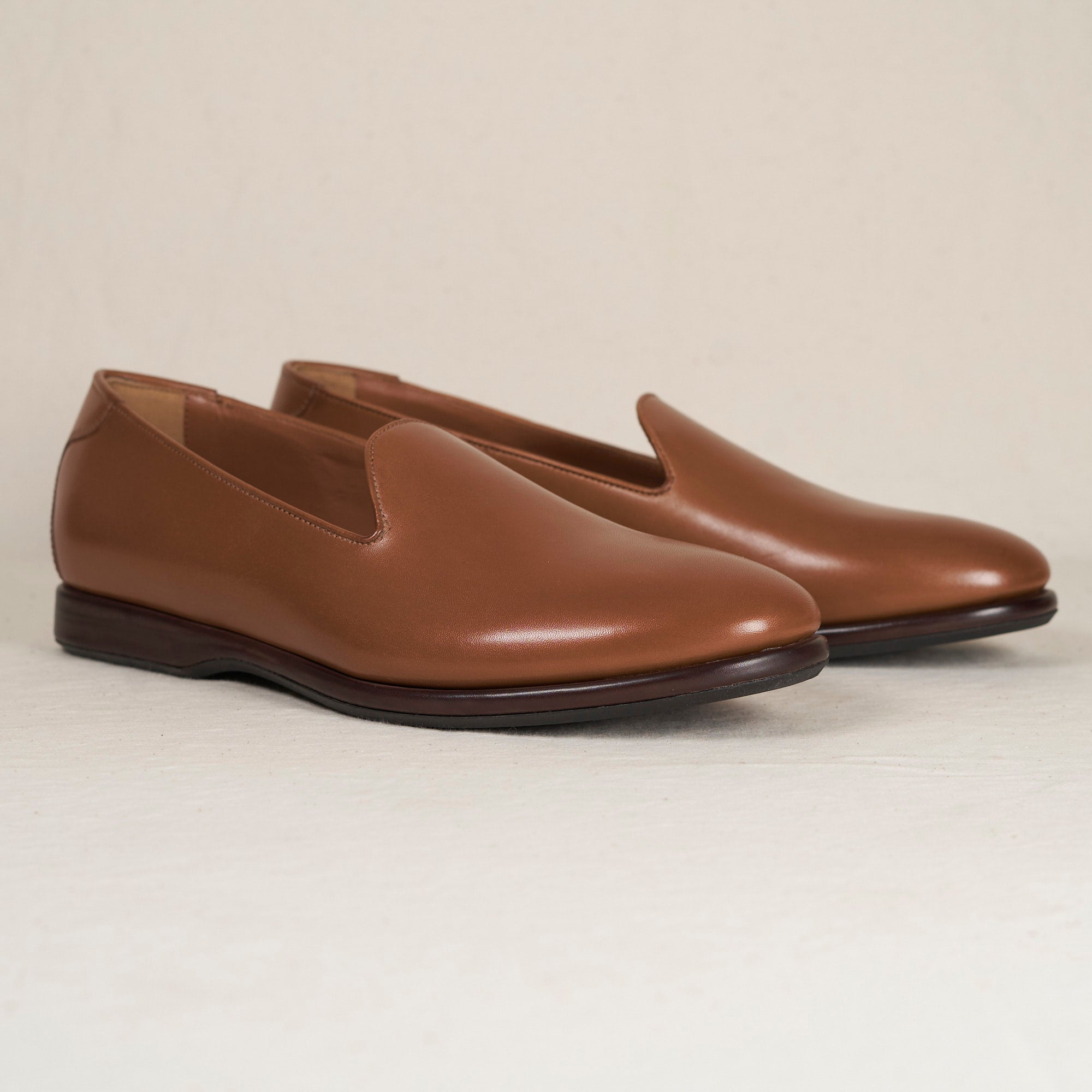 Angled view of August Special Augie Type-P cigar veg-tan calf Blake loafer — cushioned midsole, clean classic silhouette.