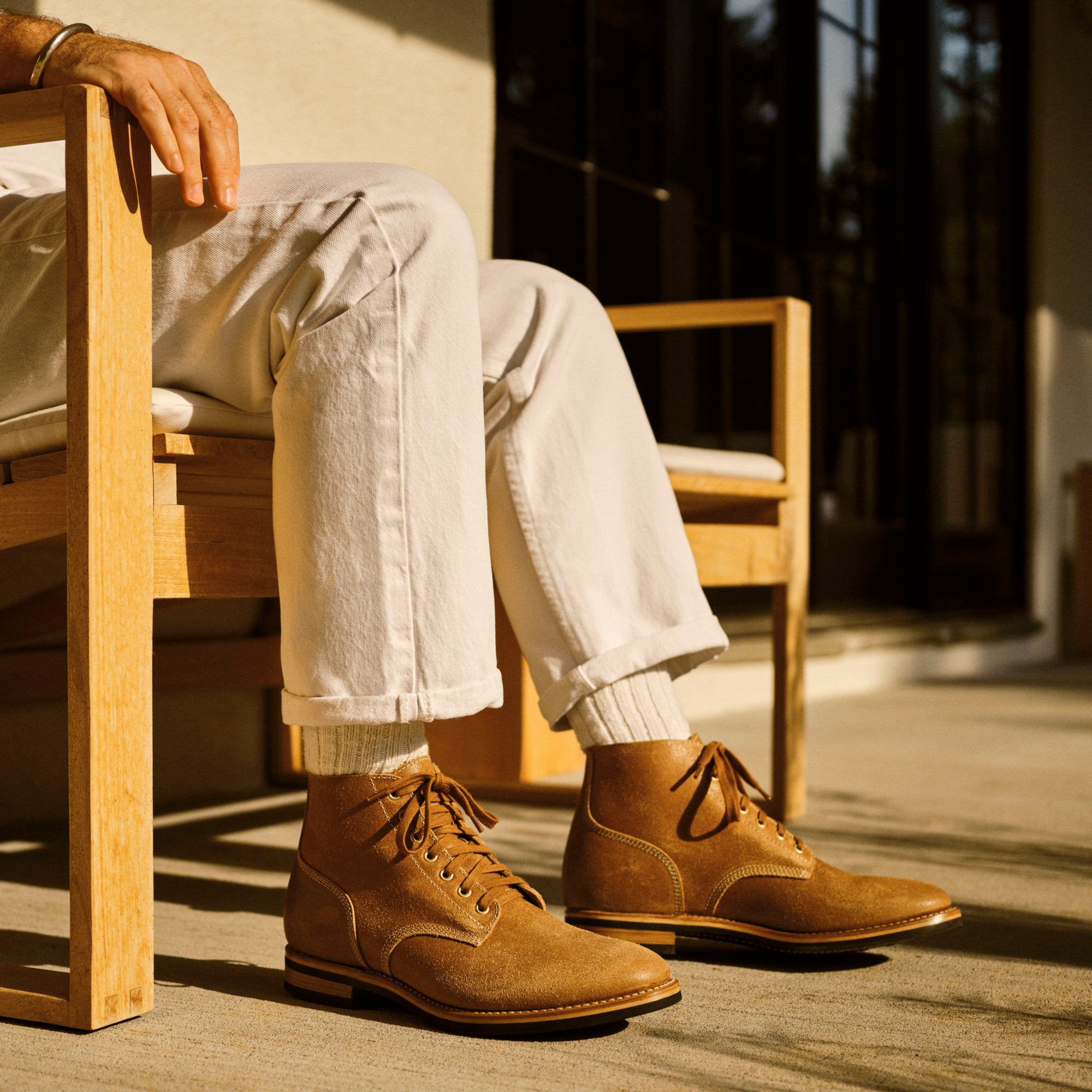 August Special - seated man vintage white denim with sueded and waxed Belliver horsehide boondocker boots