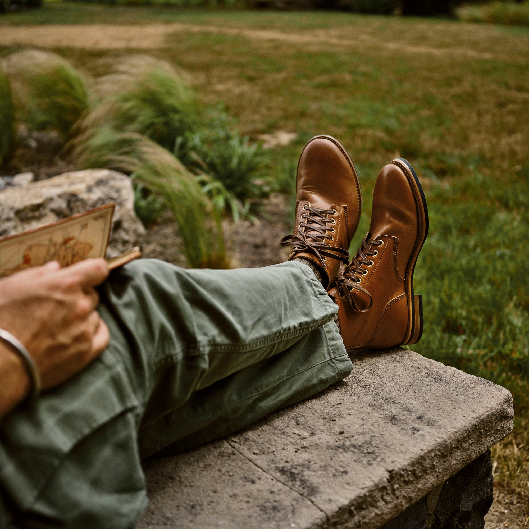 August Special - seated man in M51 cargo pants and Belliver horsehide boondocker boots