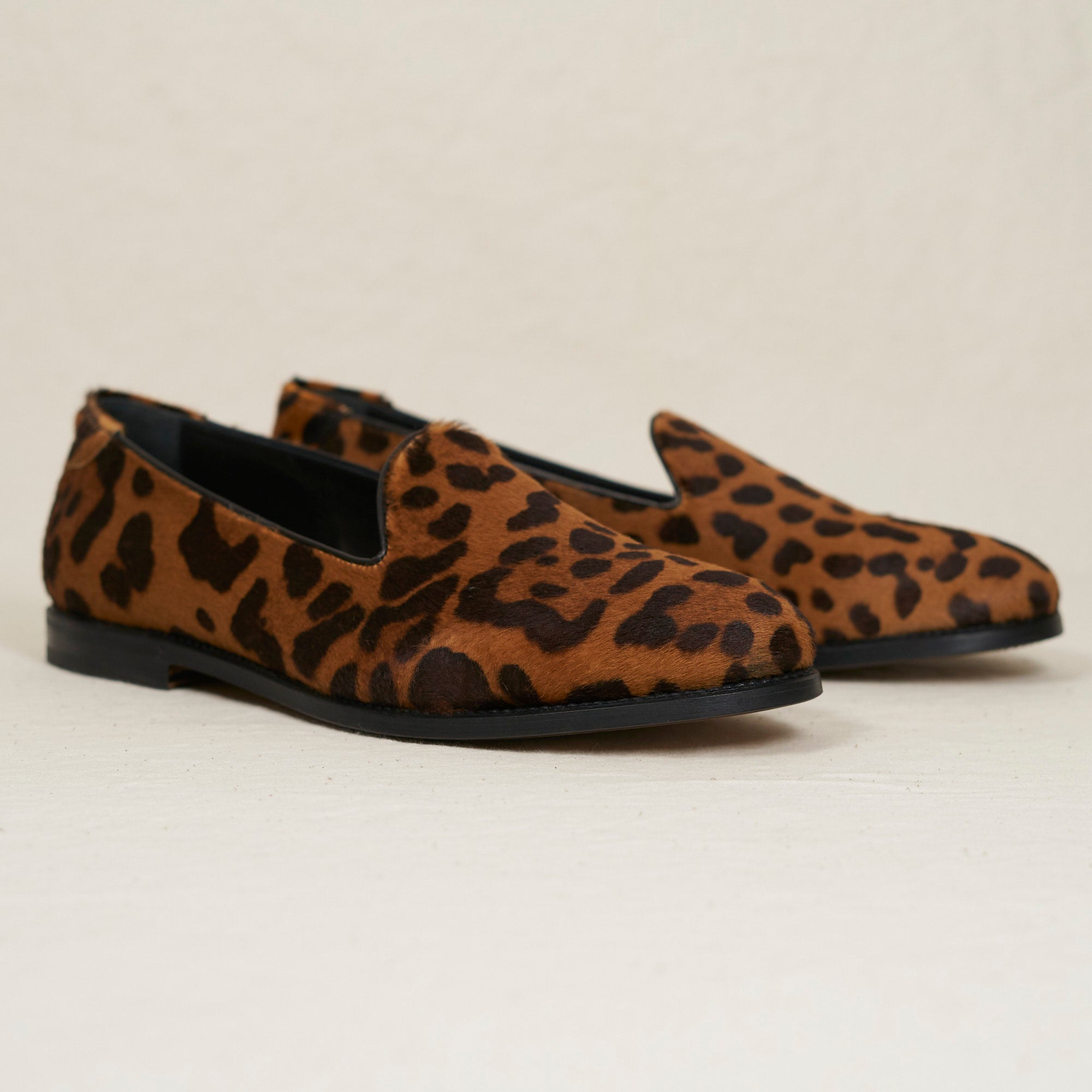 Angled view of August Special Augie Type-GP leopard haircalf Goodyear loafer — hand-sewn welt, cushioned Harry Last fit.