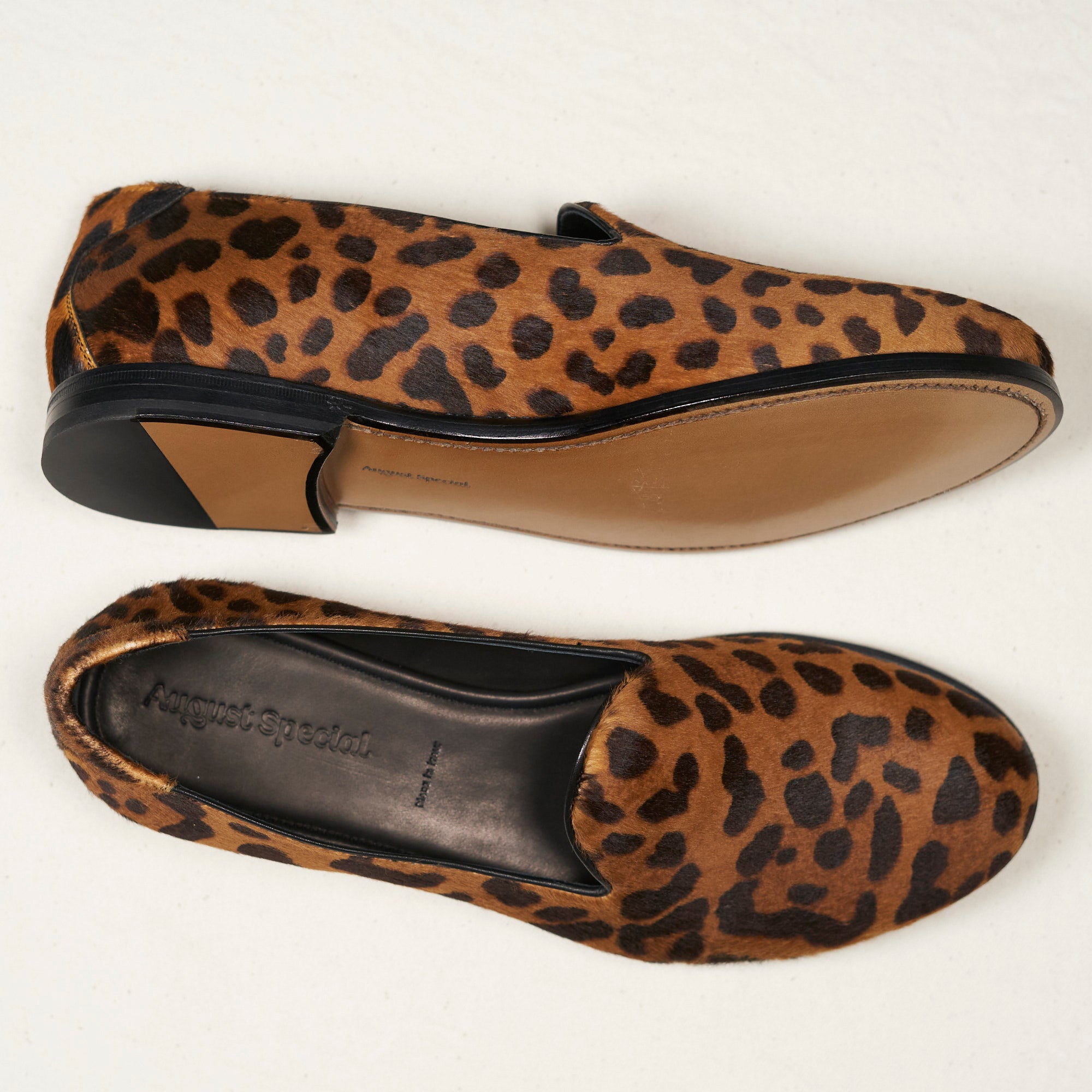 Close detail of natural leopard haircalf texture and Goodyear welt on the August Special Augie Type-GP men's loafer.