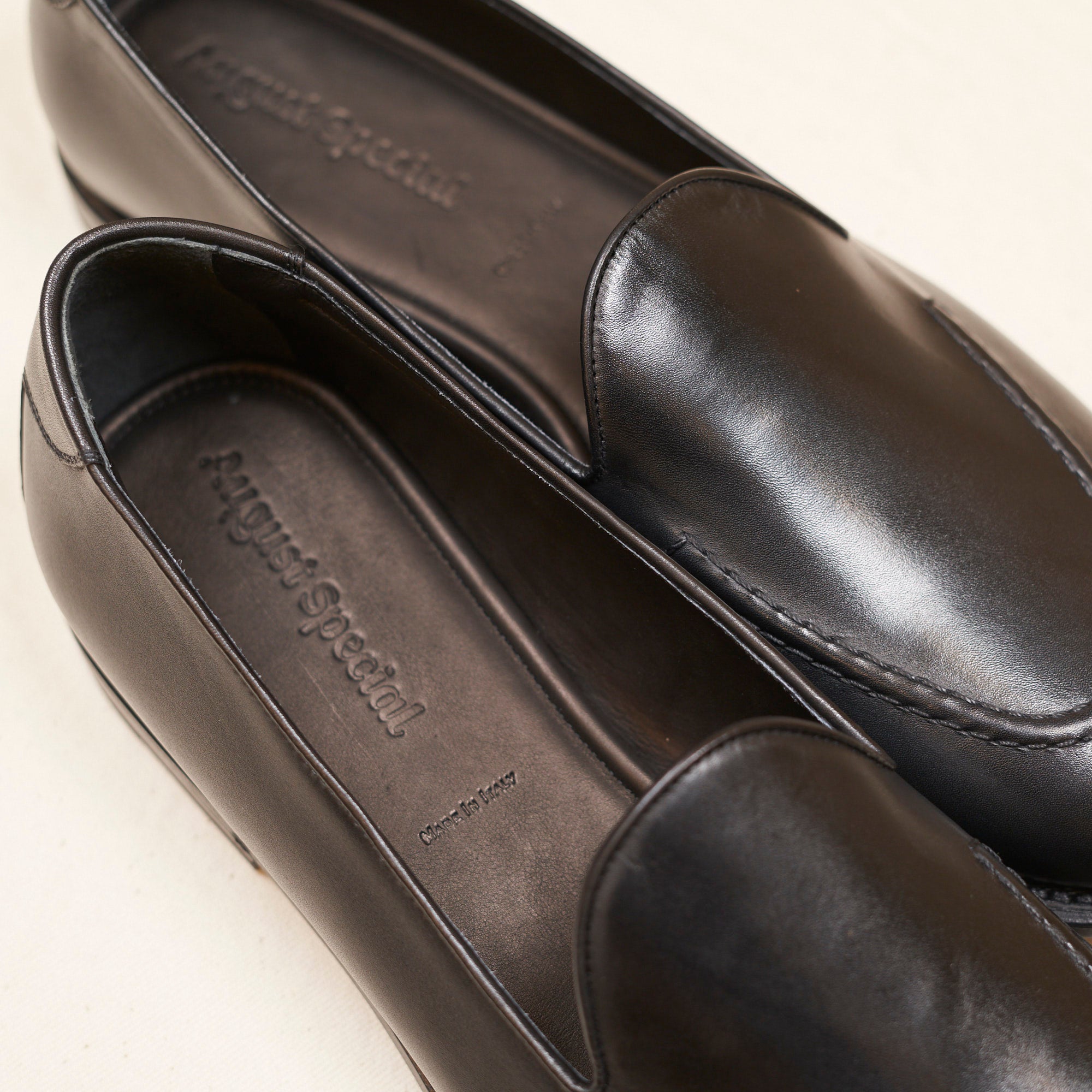 Close detail of black Maryam veg-tan calf and Goodyear welt on the August Special Augie Type-GS men's slip-on.