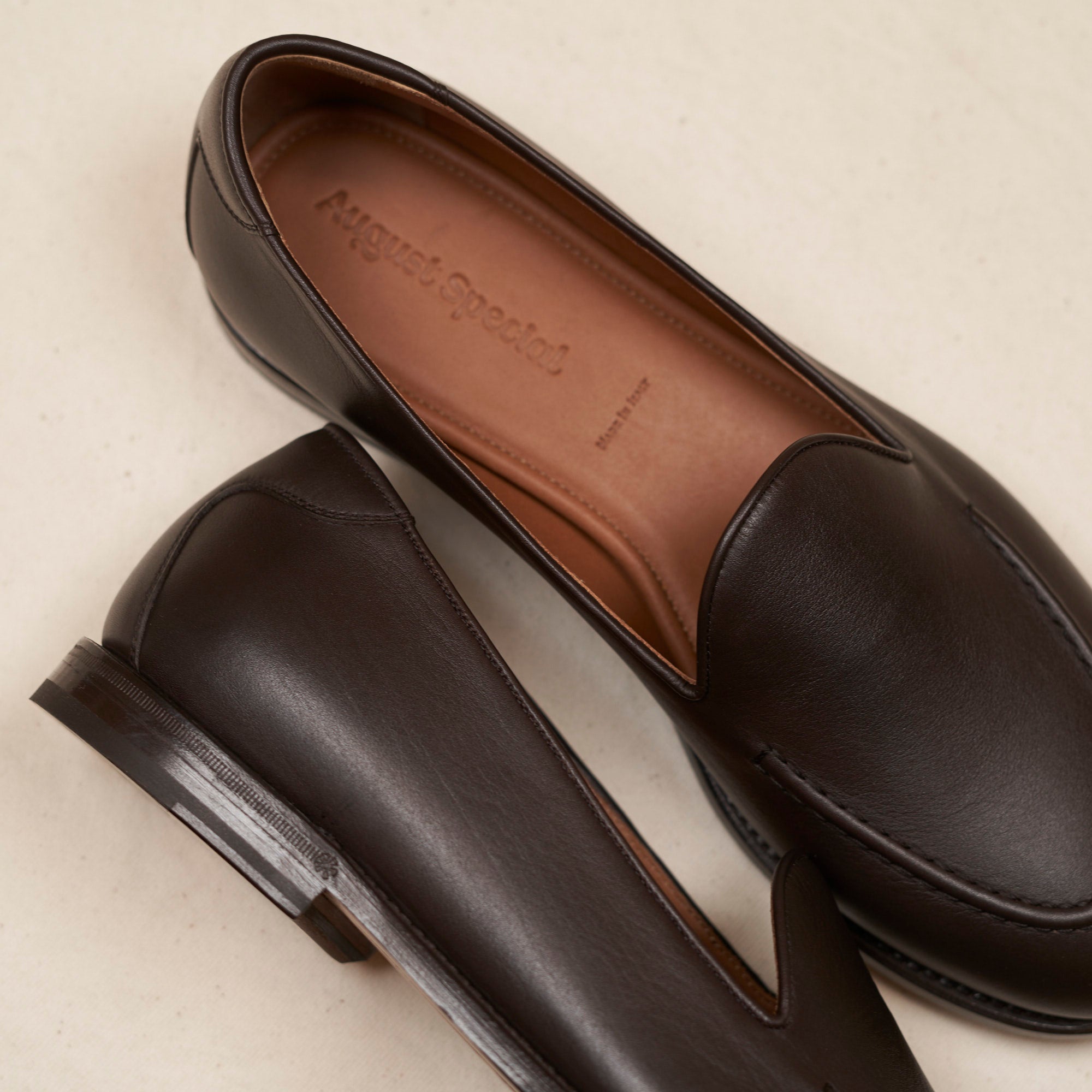 Close detail of espresso Maryam veg-tan calf and Goodyear welt on the August Special Augie Type-GS men's slip-on.
