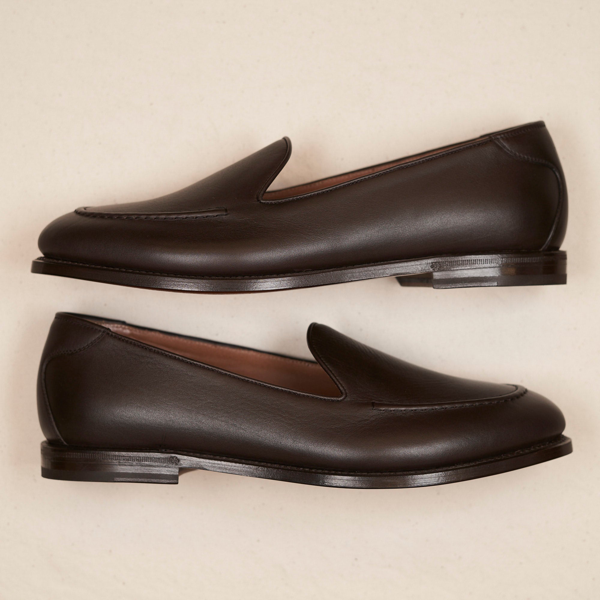 Lifestyle view of August Special Augie Type-GS espresso veg-tan calf Goodyear slip-on — classic American style.