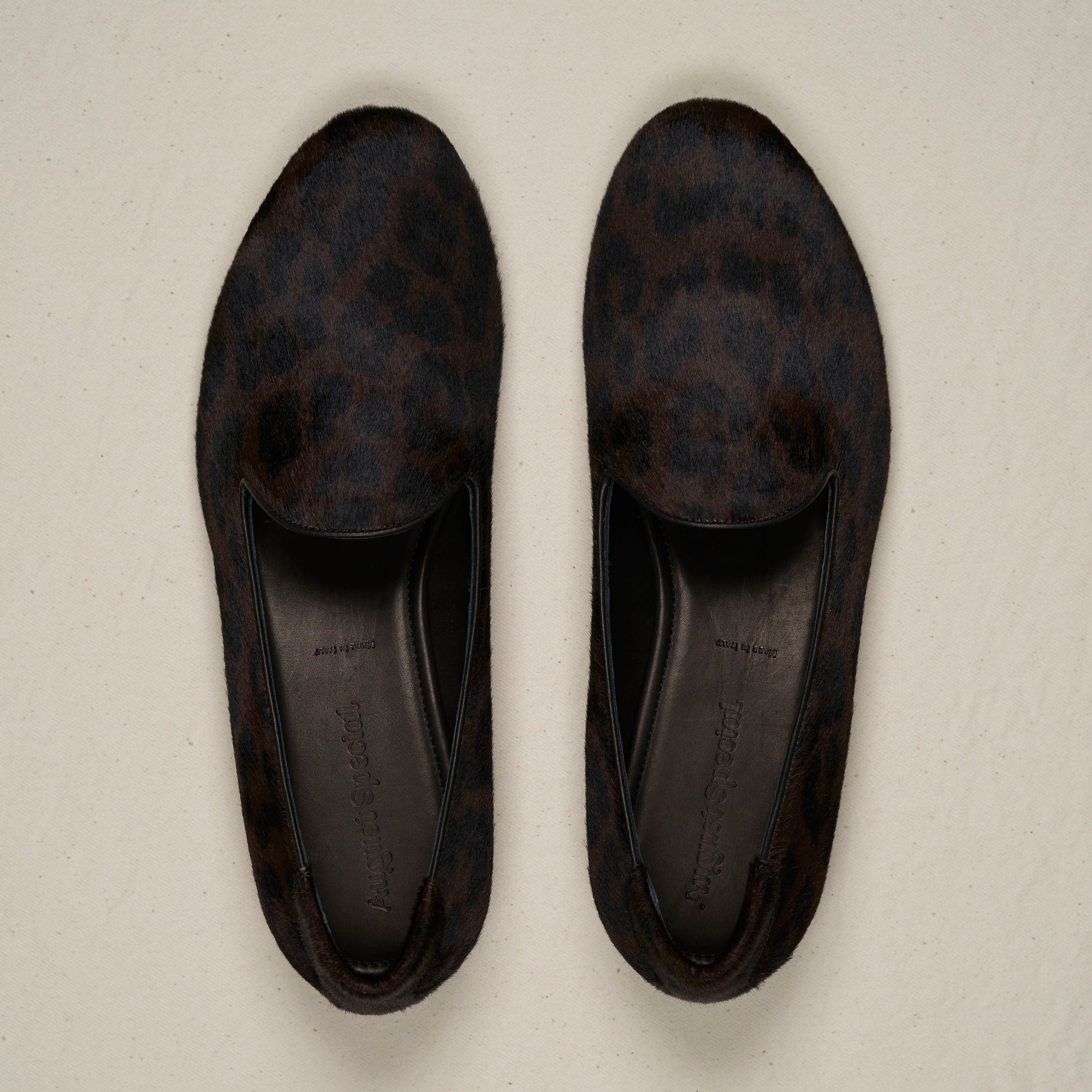 Top-down view of August Special Augie Type-P black leopard haircalf loafer — striking pattern on the roomy Harry Last.