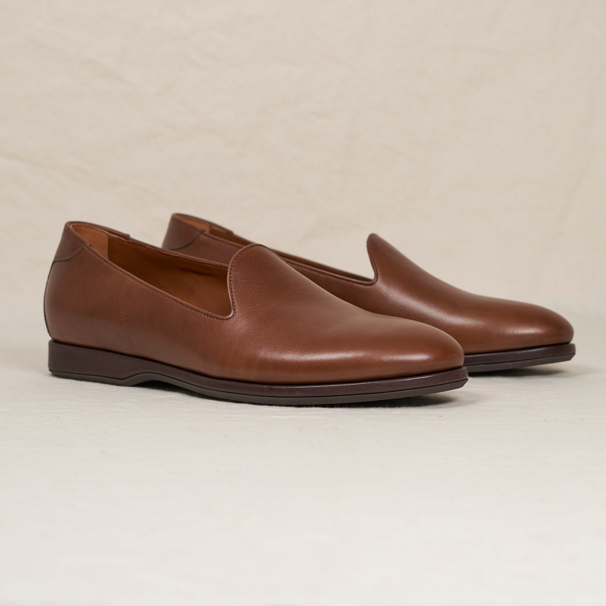 Angled view of August Special Augie Type-P cigar veg-tan calf Blake loafer — cushioned midsole, clean classic silhouette.