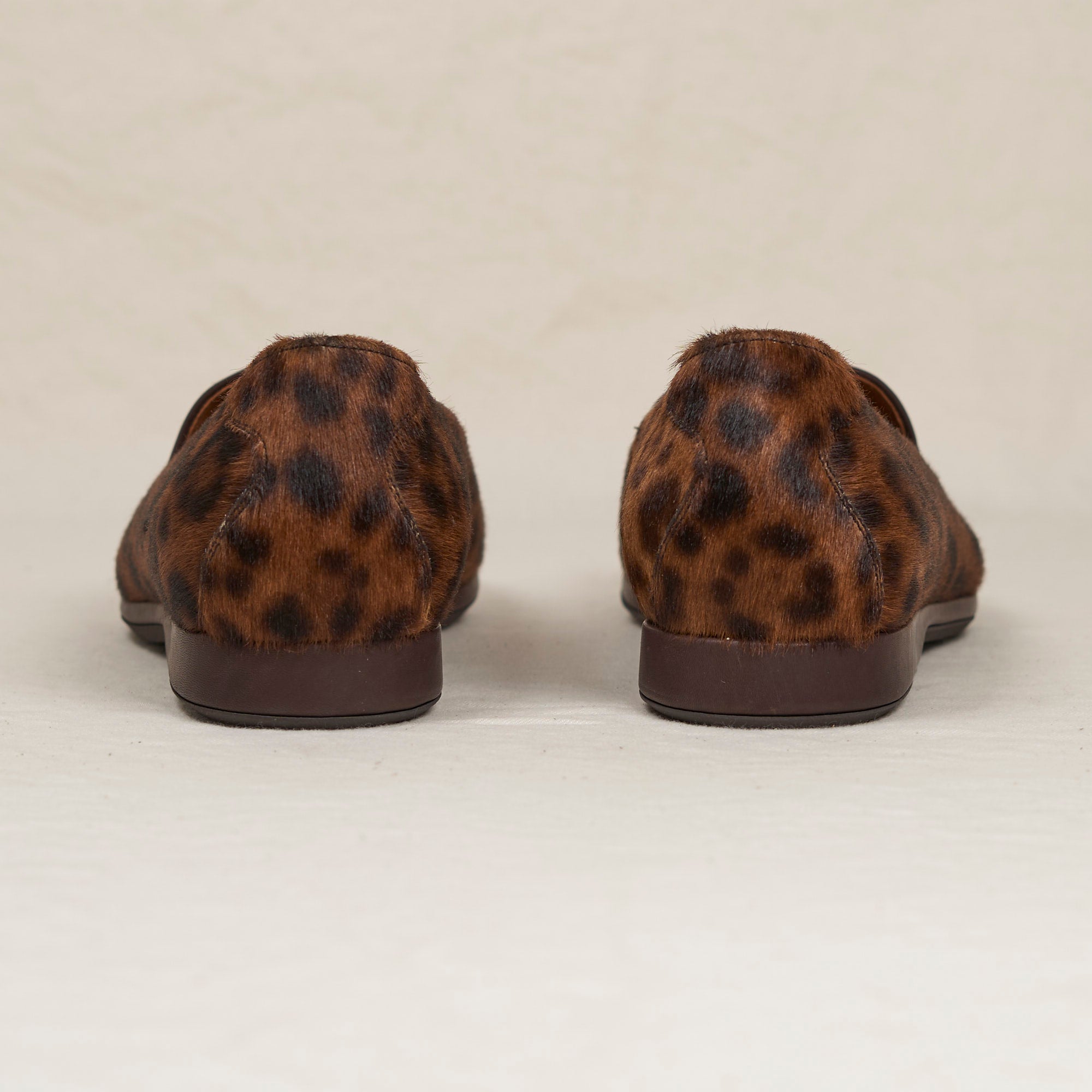 Back heel view of August Special Augie Type-P men's leopard haircalf Blake loafer — cushioned insole, Harry Last.