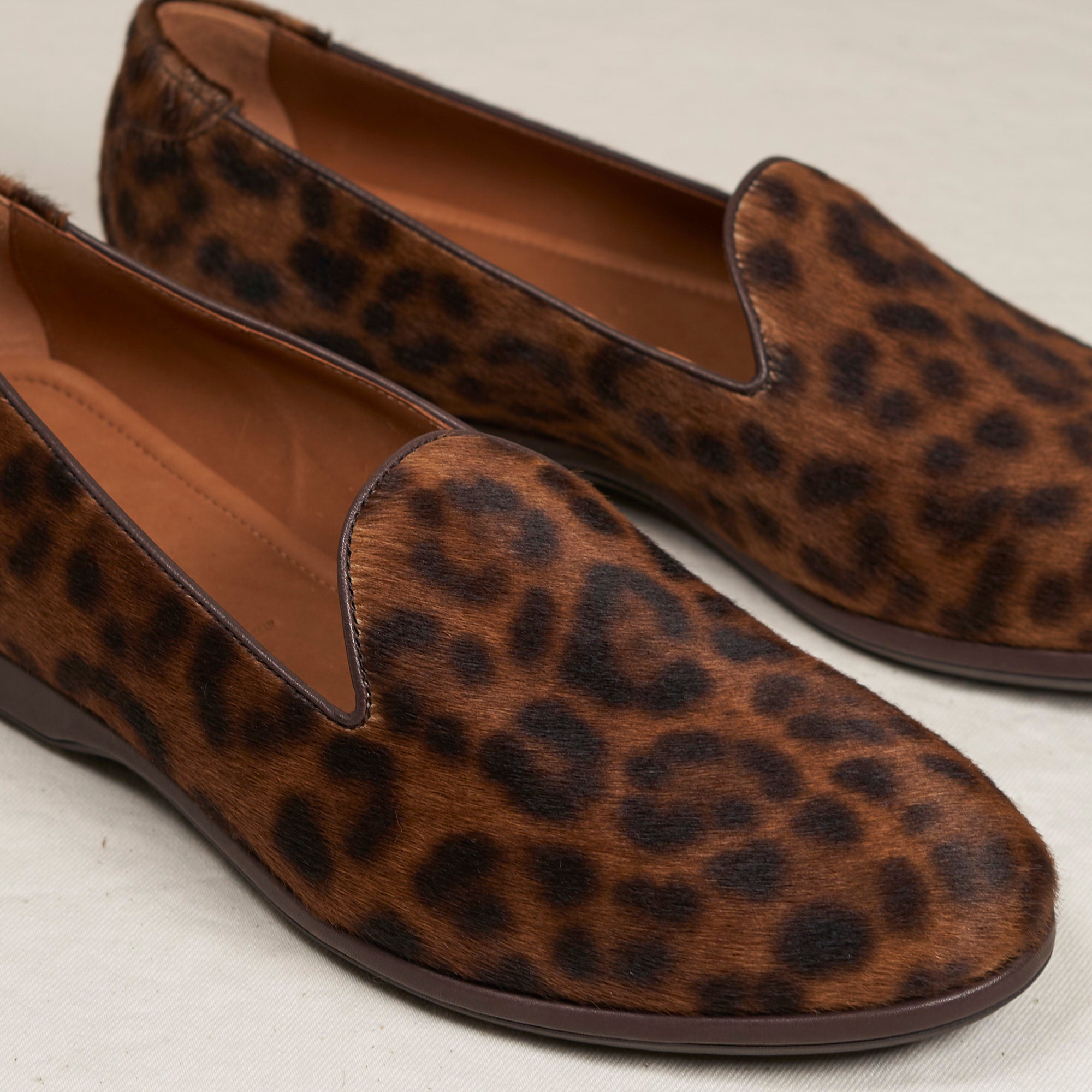 Close detail of natural leopard haircalf and Blake stitch on the August Special Augie Type-P men's loafer.