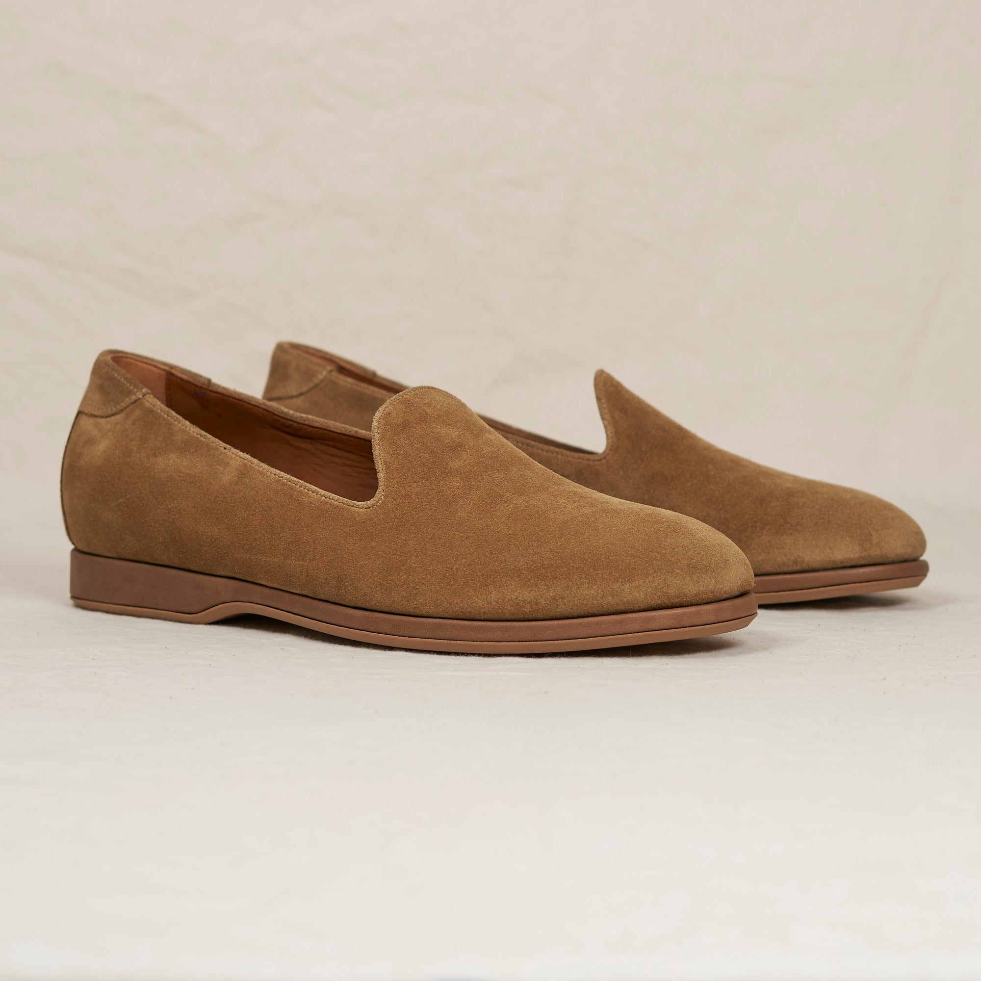 Angled view of August Special Augie Type-P sand calf suede Blake loafer — cushioned midsole, classic silhouette on Harry.