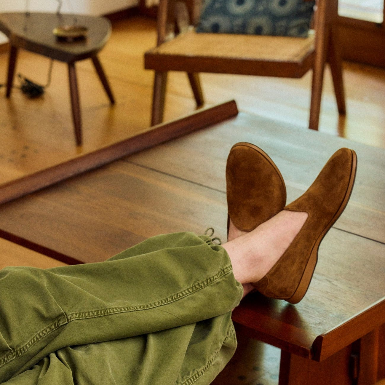Lifestyle view of August Special Augie Type-P men's tobacco suede Blake loafer — classic American style, Harry Last.