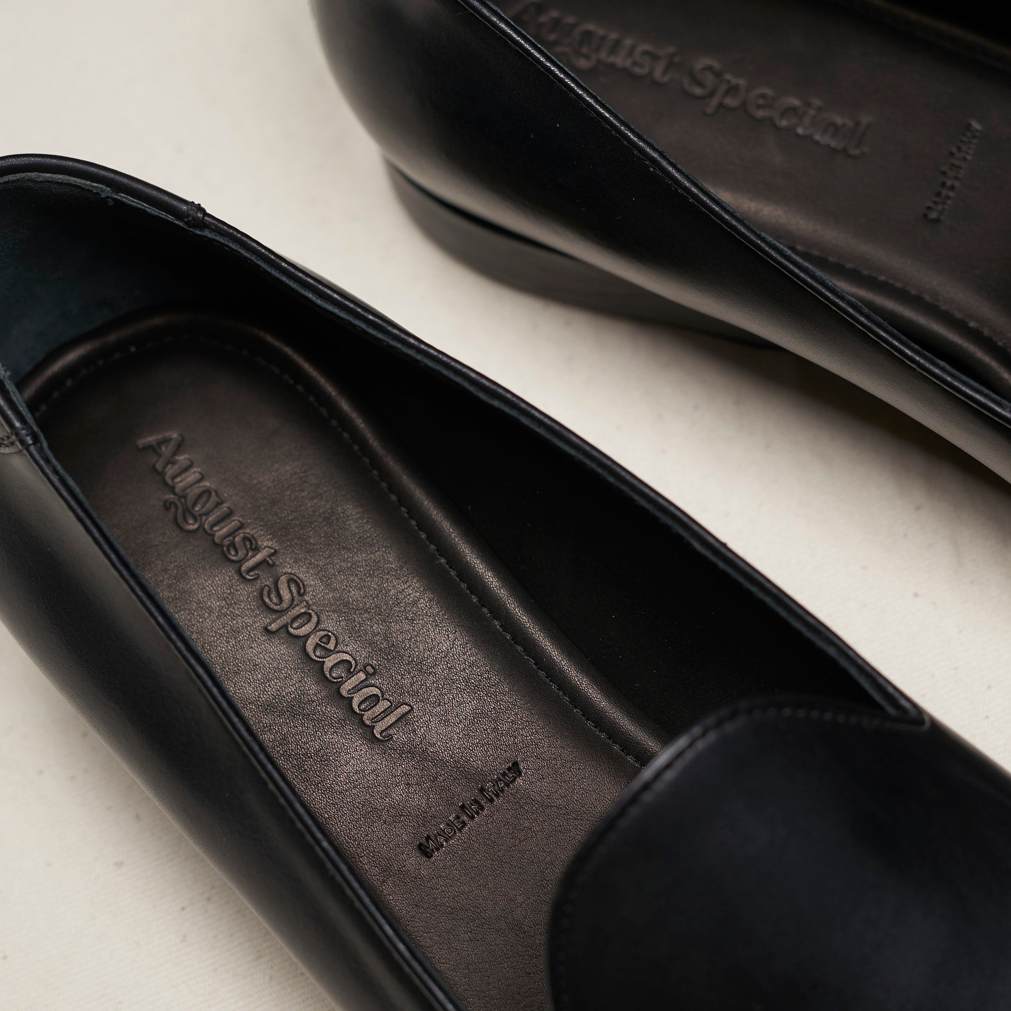 Sole view of August Special Augie Type-S black Maryam calf loafer — Blake-stitched rubber outsole and veg-tan leather welt.