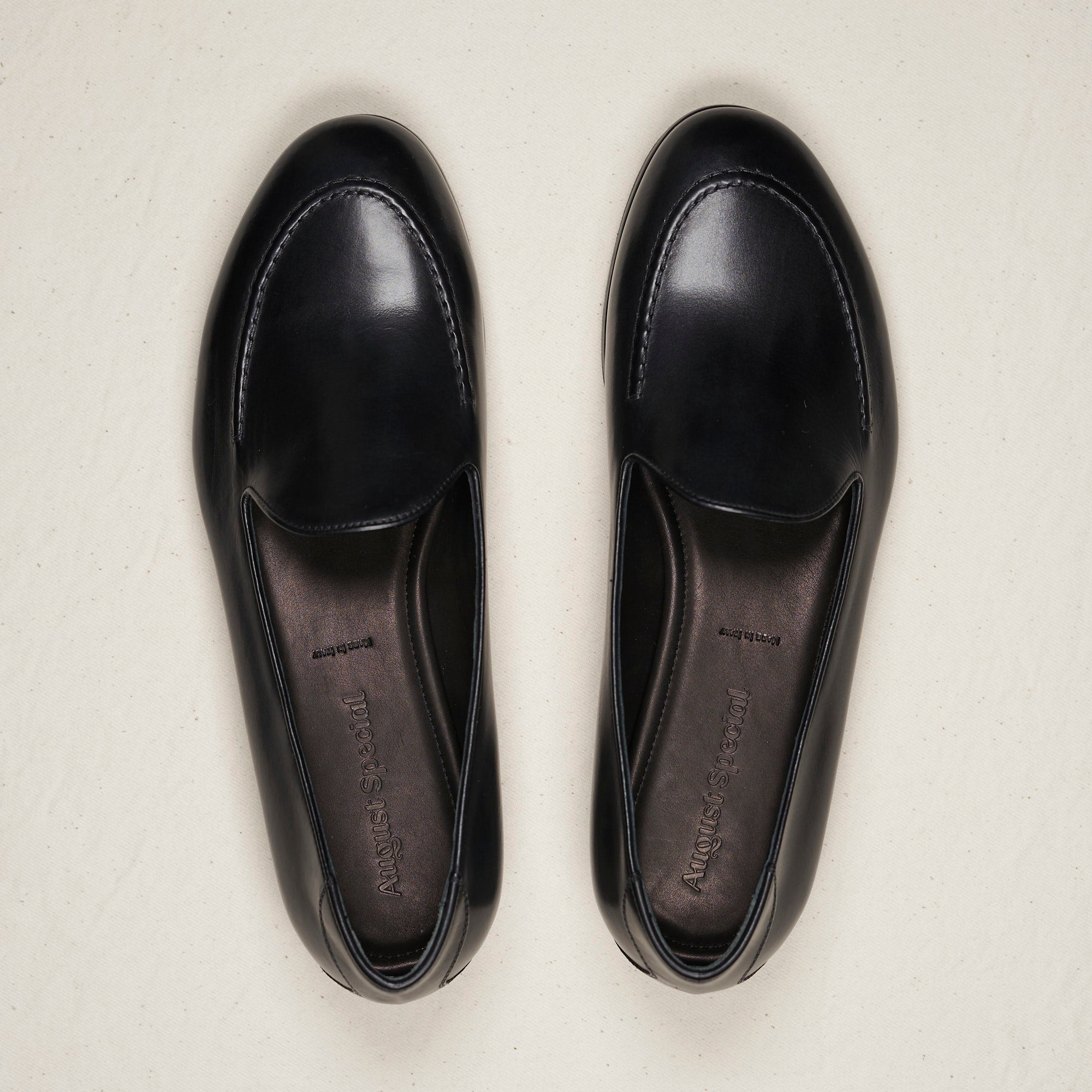 Top-down view of August Special Augie Type-S black Maryam calf loafer — hand-sewn vamp stitch, roomy Harry Last toe box.