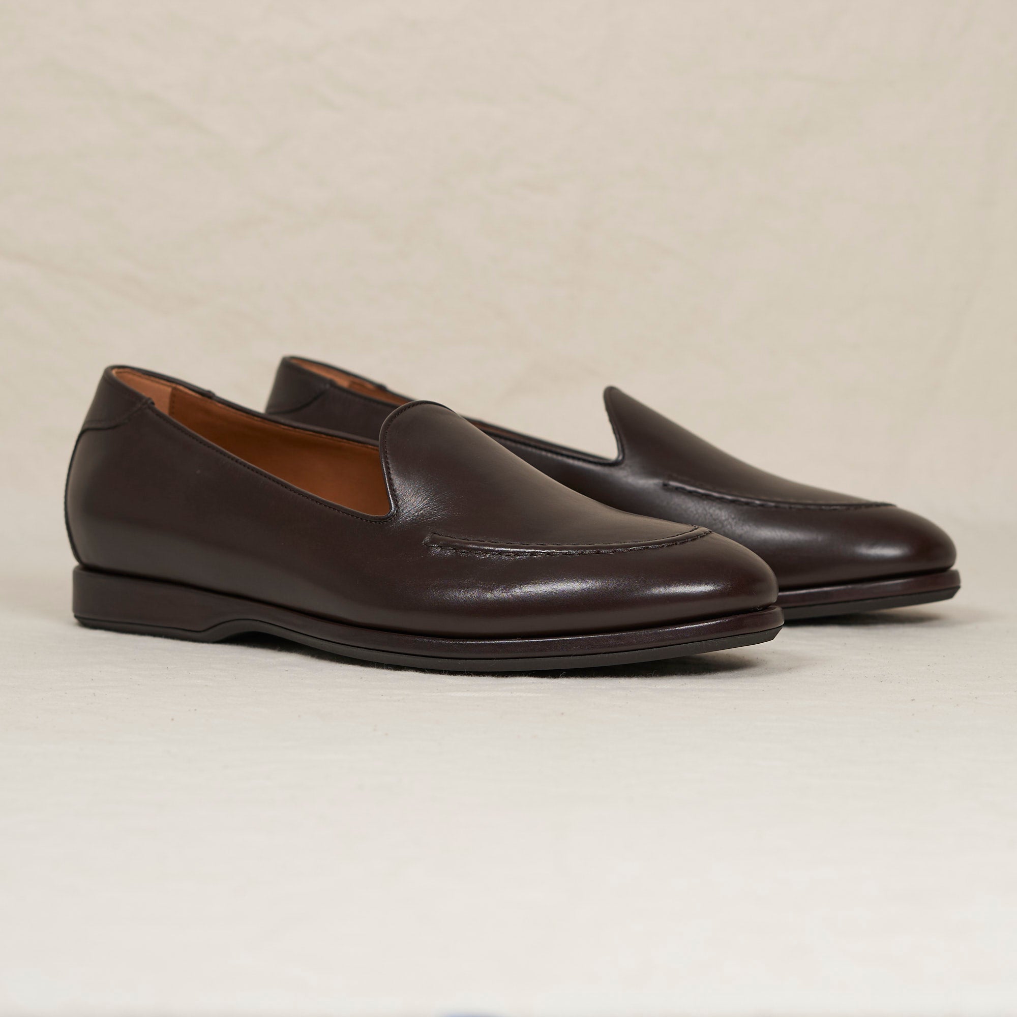 Angled view of August Special Augie Type-S espresso Maryam calf Blake loafer — hand-sewn vamp stitch, cushioned Harry Last.