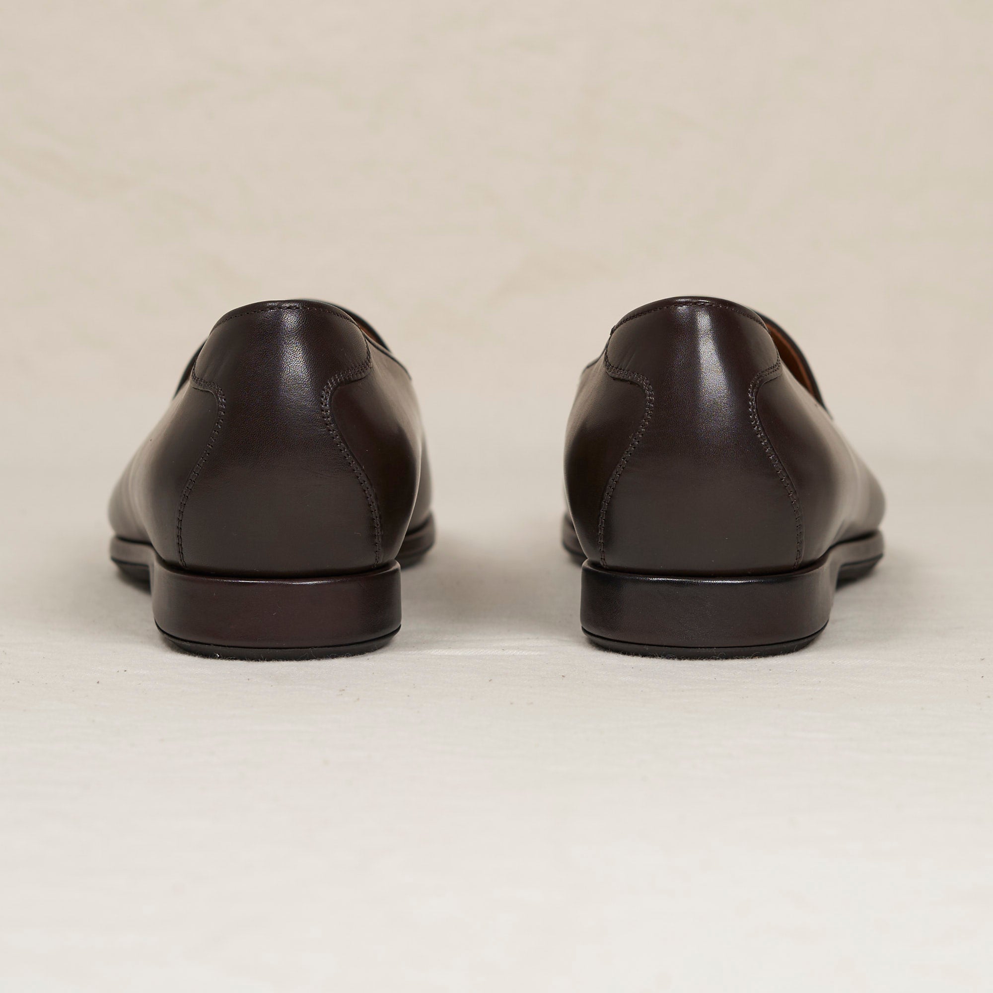 Back heel view of August Special Augie Type-S men's espresso veg-tan calf Blake loafer — cushioned insole, Harry Last fit.