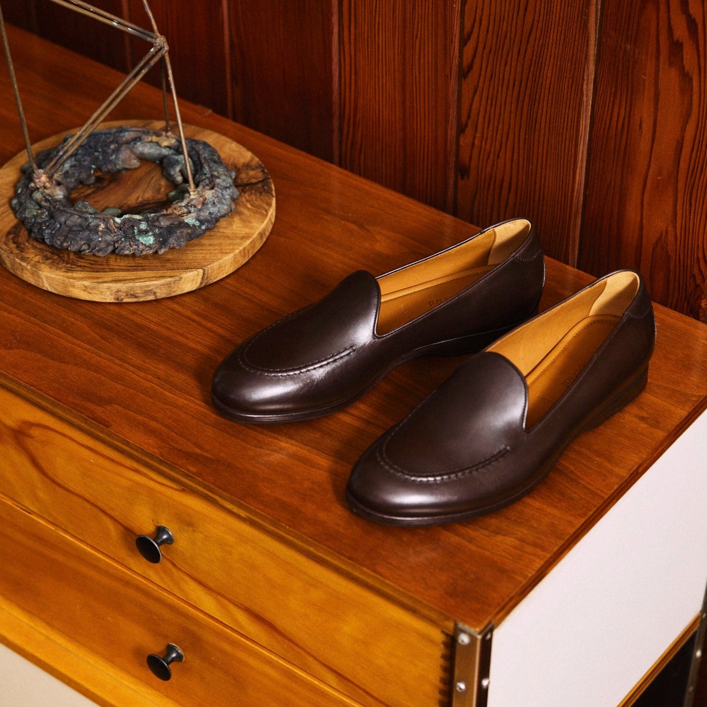 Lifestyle view of August Special Augie Type-S men's espresso Maryam calf loafer — Blake-stitched rubber outsole and veg-tan welt. Classic American style.