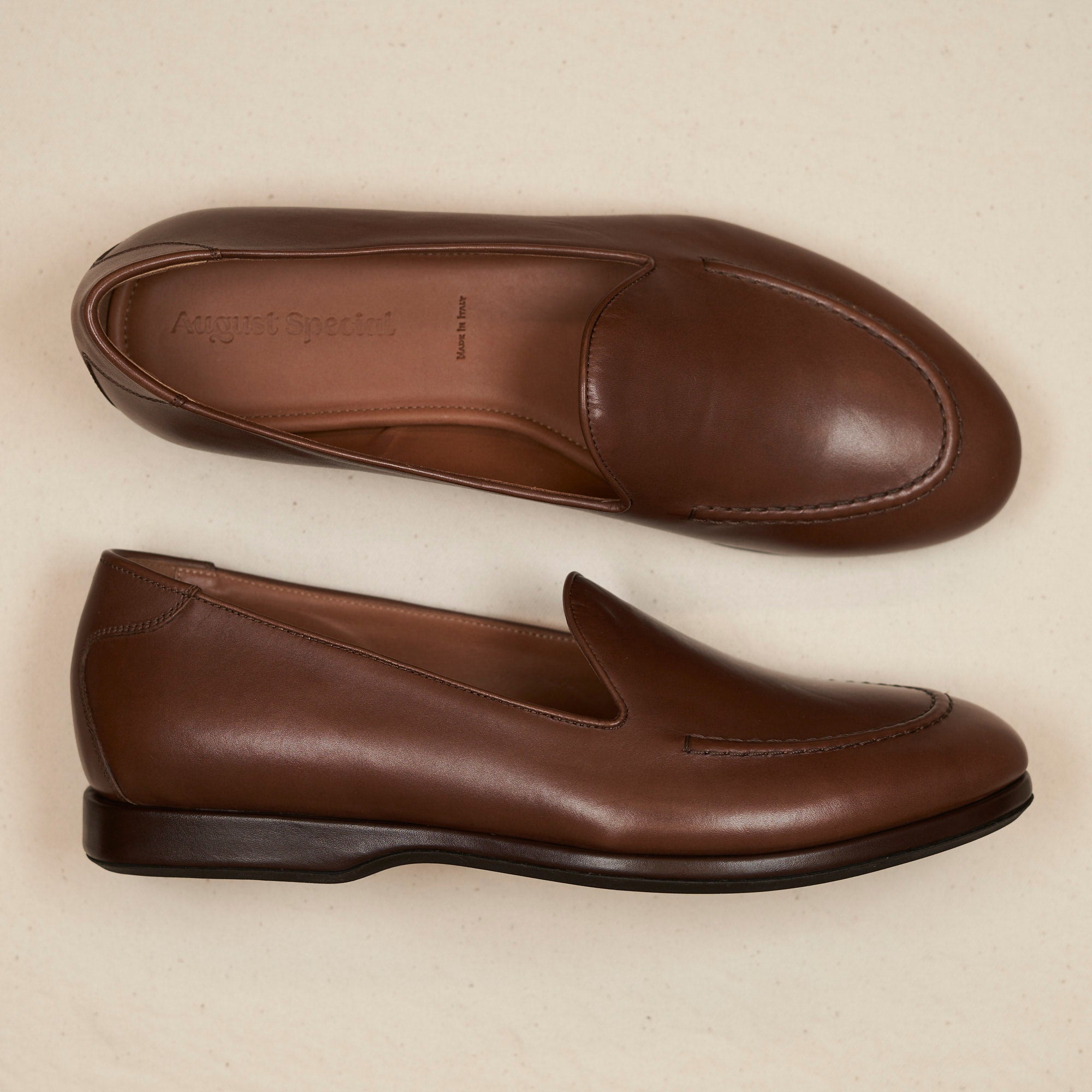 Lifestyle view of August Special Augie Type-S men's maduro Maryam calf Blake loafer — classic American style.