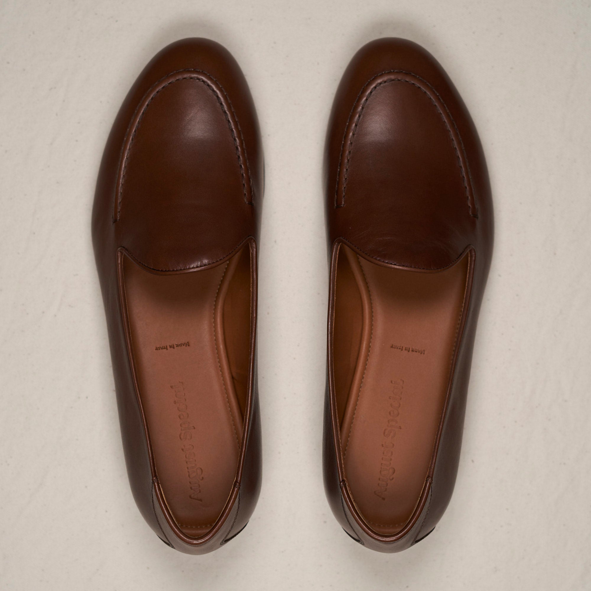 Top-down view of August Special Augie Type-S maduro black Maryam calf loafer — hand-sewn vamp stitch, roomy Harry Last.