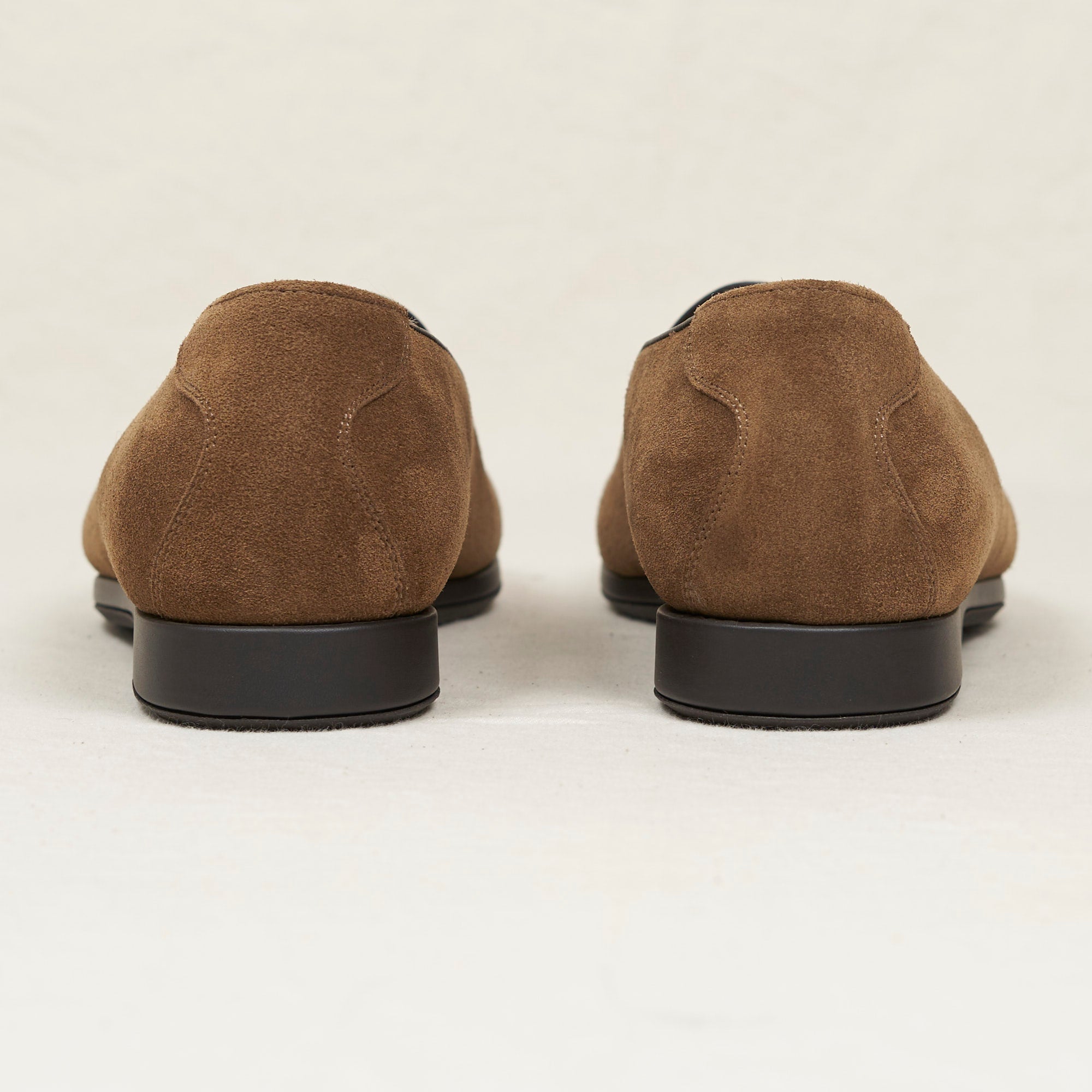 Back view of August Special Augie Type-SH walnut suede shearling loafer — Blake-stitched rubber outsole and leather welt.