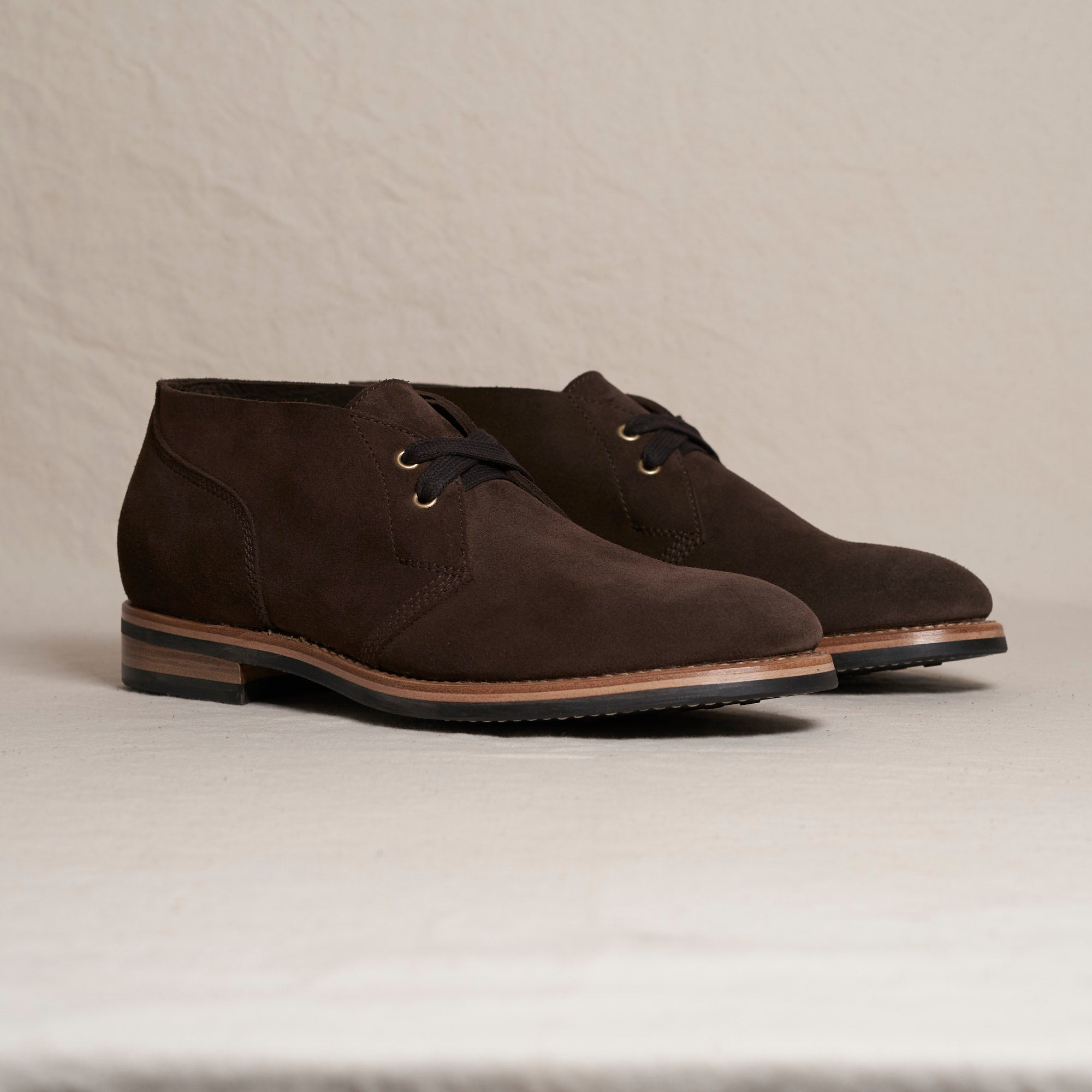 Angled view of August Special Aviator chocolate Maryam suede Goodyear chukka — classic silhouette, Vibram outsole.