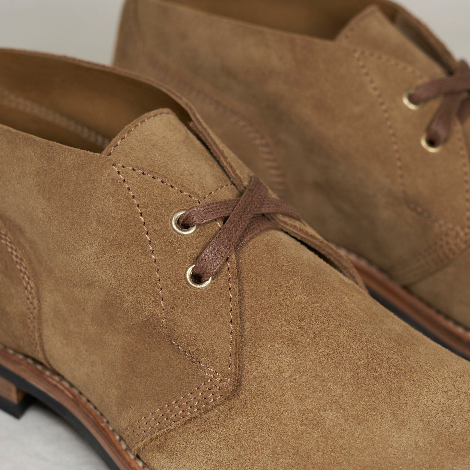 Close detail of marraca suede and Goodyear welt construction on the August Special Aviator men's chukka boot.
