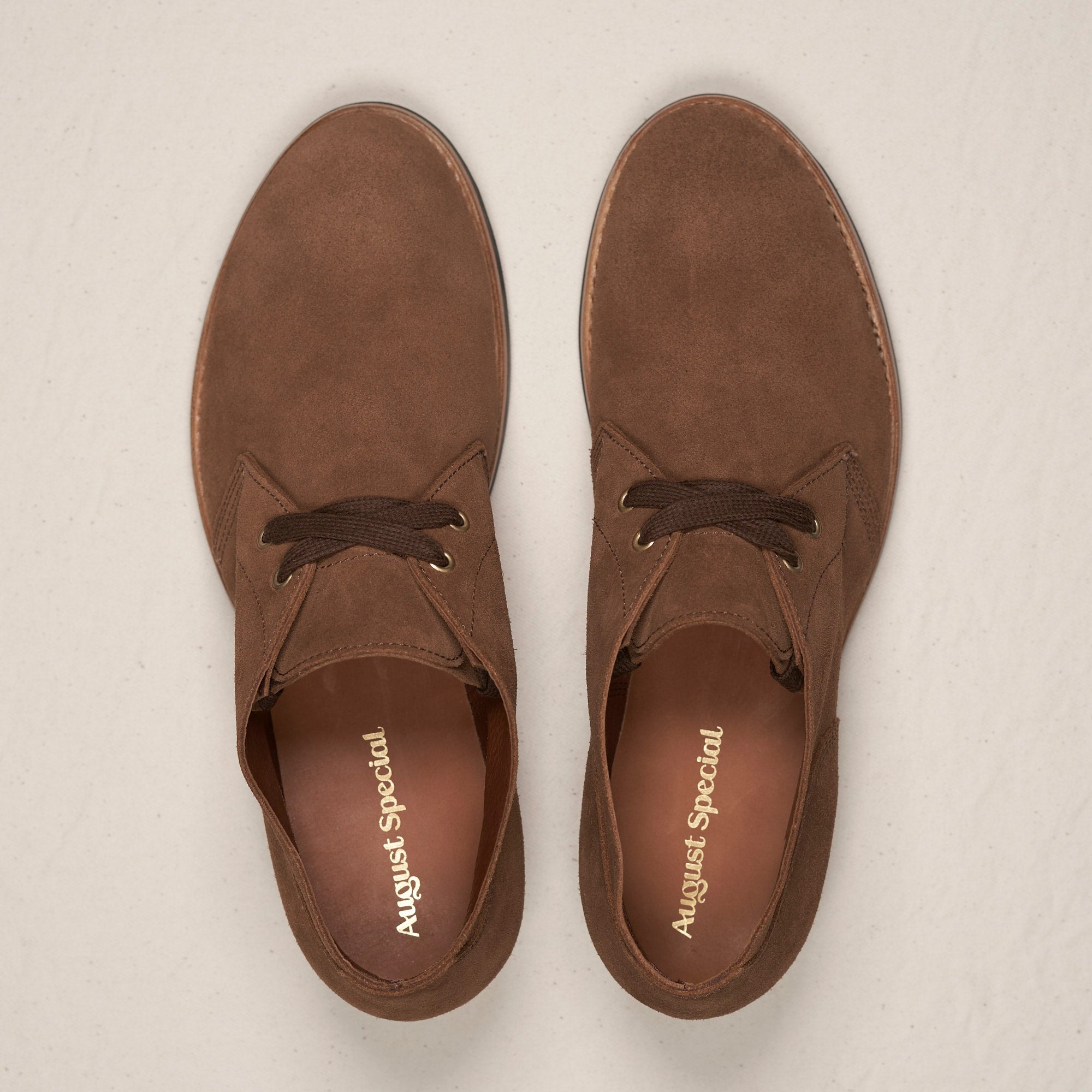Top-down view of August Special Aviator men's snuff veg-tan suede chukka — Goodyear welt, cushioned footbed.