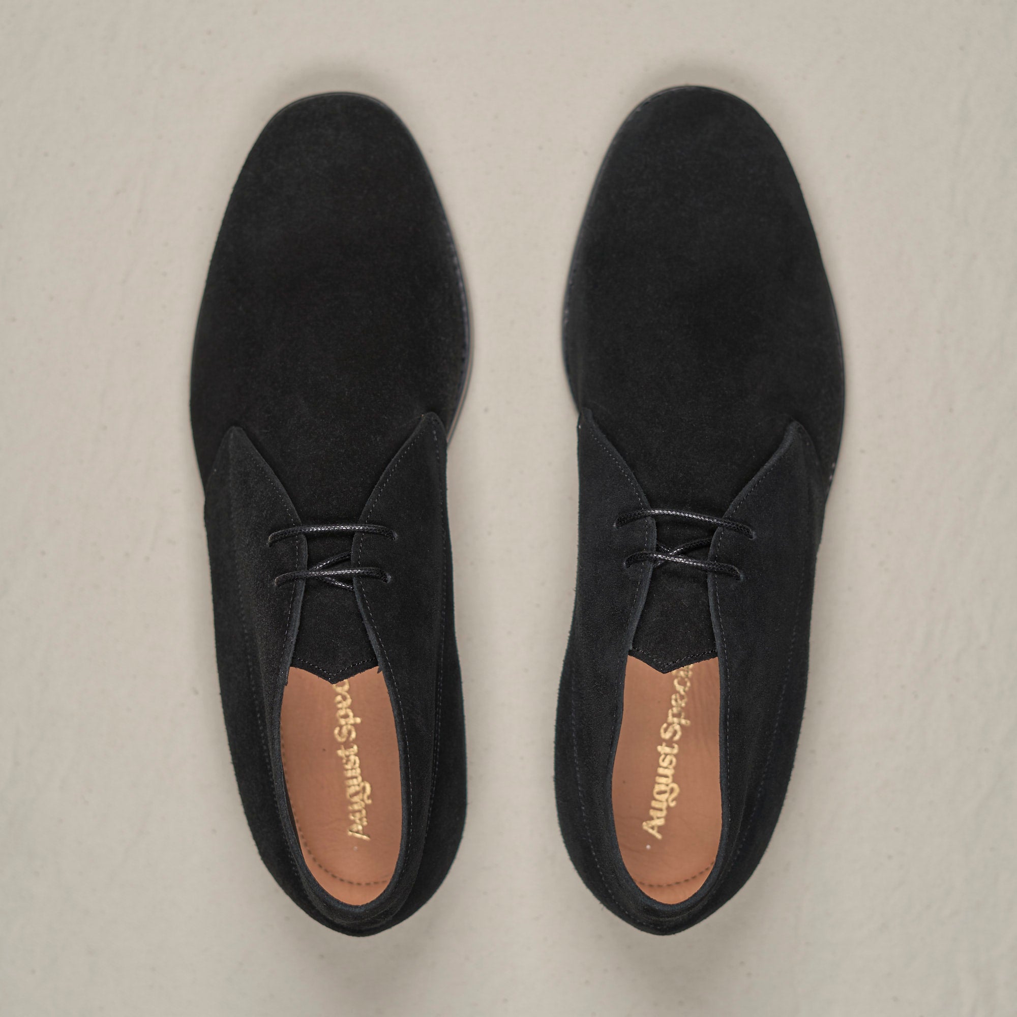 Top-down view of August Special Voyager men's black suede chukka — Voyager Last, Blake stitch, padded footbed.